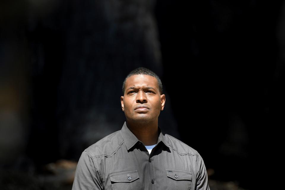 U.S. EPA Administrator Michael Regan walks through Big Basin Redwoods State Park near Boulder Creek, Calif., Tuesday, Aug. 17, 2021.