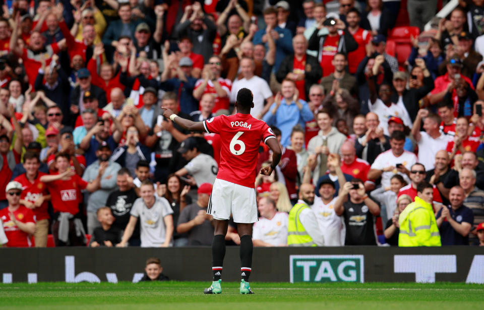 Manchester United’s Paul Pogba celebrates scoring their fourth goal