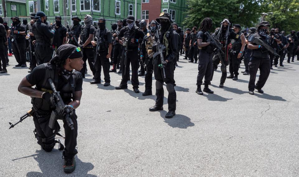 Police in Louisville, Kentucky, kept opposing groups apart as protesters demanding racial justice marched to Jefferson Square for a rally on July 25.