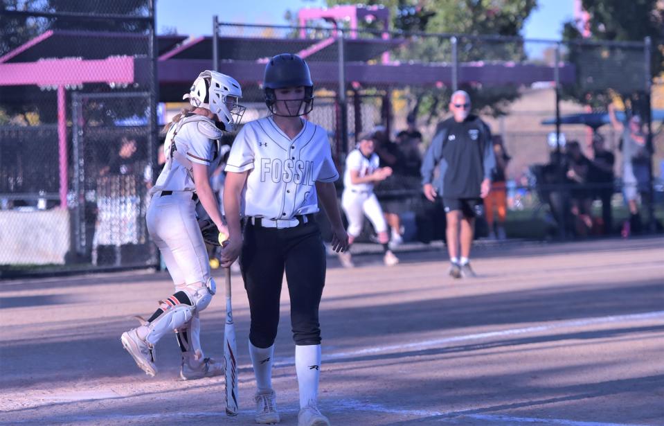 Fossil Ridge softball batter Baylee Rosecrans reacts after striking out to end the game in the SaberCats' loss to Erie in the Colorado 5A state softball tournament on Friday, Oct. 21, 2022 at Aurora Sports Park.