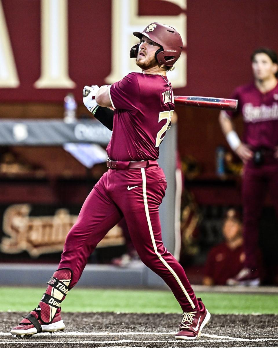FSU baseball player James Tibbs gets a hit against Florida in FSU’s 19-4 win over Florida Tuesday night at Dick Howser Stadium
