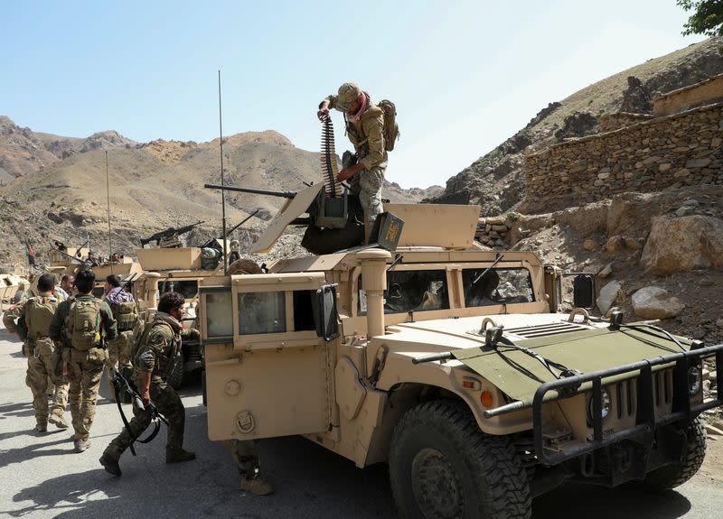 FILE PHOTO: Afghan Commando forces armoured convoy leaves toward the front line, at the Ghorband District