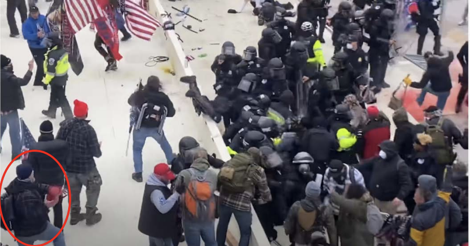 Images from video footage captured at the Jan. 6, 2021, riot at the U.S. Capitol allegedly show retired firefighter Robert Sanford in the crowd and throwing a fire extinguisher at a police officer.