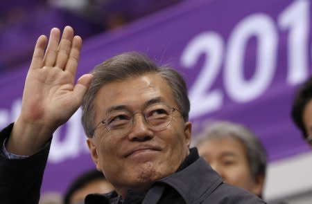 Short Track Speed Skating Events - Pyeongchang 2018 Winter Olympics - Women's 1500m - Gangneung Ice Arena - Gangneung, South Korea - February 17, 2018 - South Korea's President Moon Jae-in waves. REUTERS/John Sibley