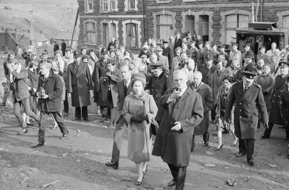 <p>Following the 1966 <a href="https://www.history.com/news/queen-elizabeth-ii-key-moments" rel="nofollow noopener" target="_blank" data-ylk="slk:Aberfan tragedy" class="link ">Aberfan tragedy</a>—in which the collapse of a colliery spoil tip buried an elementary school and killed over 100 people—Queen Elizabeth visited the South Wales village.</p>