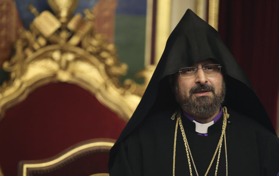 Bishop Sahak Masalyan speaks during a special ceremony after his election as the new Patriarch of Turkey's Armenian community, in Istanbul, Wednesday, Dec. 11, 2019. Armenian community voted on Wednesday Masalyan as its new patriarch, in an election critics say was overshadowed by Turkish government intervention. (AP Photo/Emrah Gurel)