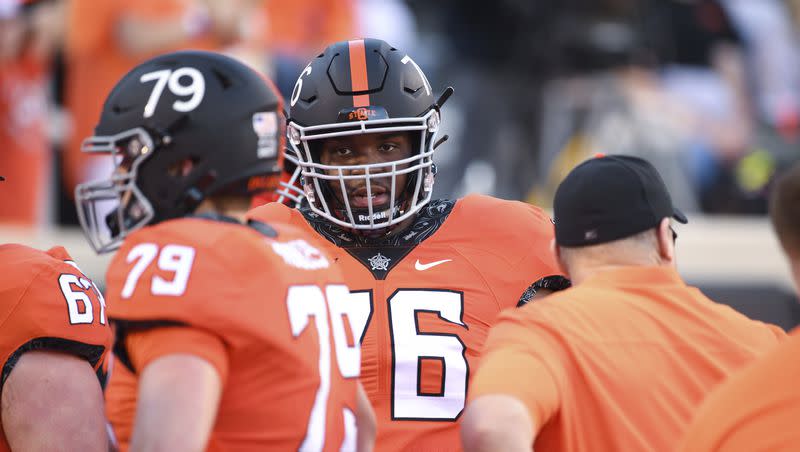 Former Oklahoma State offensive lineman Caleb Etienne, who started all 13 games for the Cowboys in 2022, transferred to BYU to play for the Cougars as the team enters the Big 12 this season.