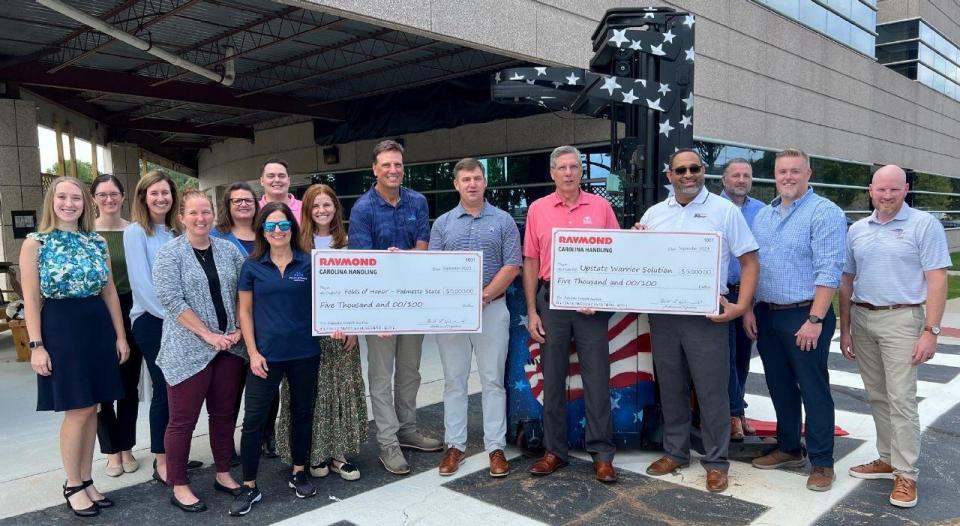 A forklift was painted with patriotic images and sold to benefit Folds of Honor and Upstate Warrior Solution.