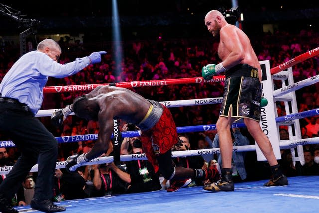 Tyson Fury knocks out Deontay Wilder to win in the 11th round of their trilogy fight