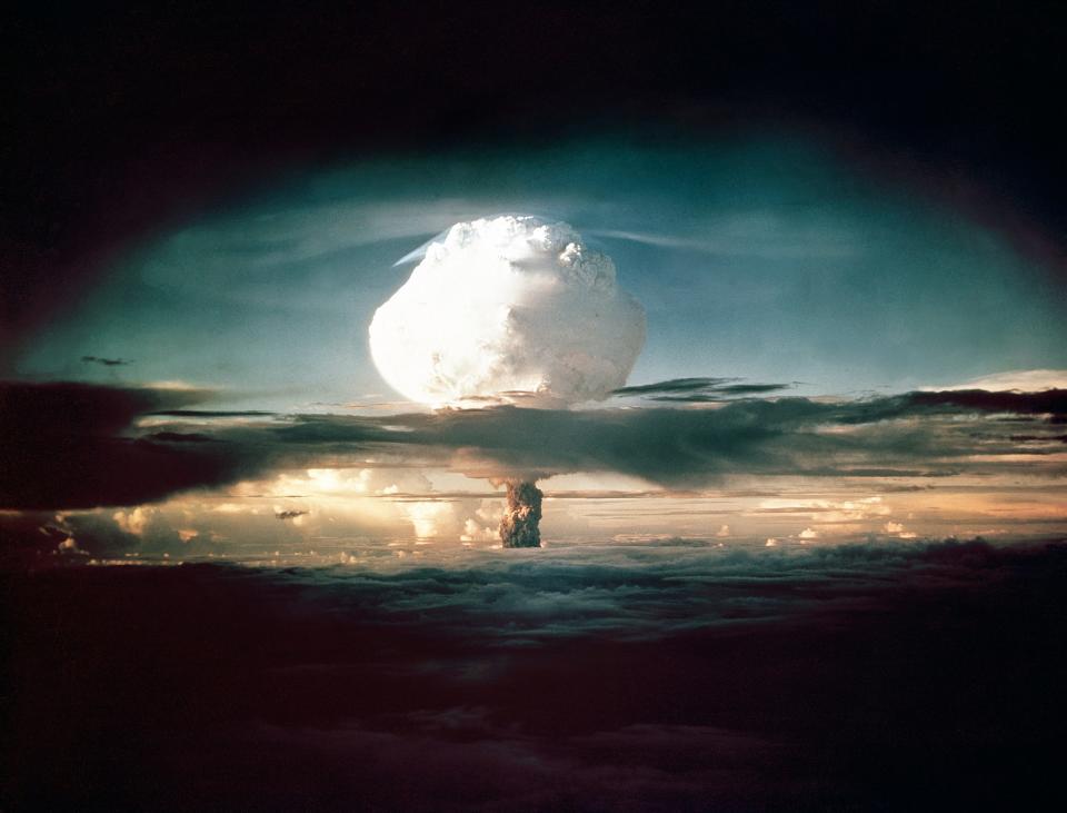 The mushroom cloud from Ivy Mike (codename given to the test) rises above the Pacific Ocean over the Enewetak Atoll in the Marshall Islands on November 1, 1952 at 7:15 am (local time). It was the world's first test of a full-scale thermonuclear device, in which part of the explosive yield comes from nuclear fusion.
