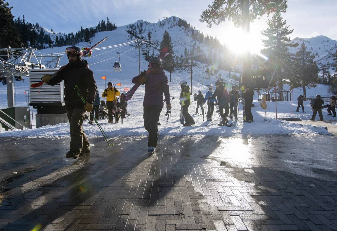 Skiers and snowboarder finish their run at Palisades Tahoe on Thursday, Jan. 11, 2024 in Placer County. A skier died after an avalanche on Wednesday and three other skiers suffered non-life threatening injuries.