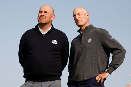 U.S. Ryder Cup captain Jim Furyk (R) and European Ryder Cup Captain Thomas Bjorn (L) attend a golf event at France's Golf National where the Ryder Cup 2018 tournament will be held at Saint-Quentin-en Yvelines, France, October 16, 2017. REUTERS/Charles Platiau
