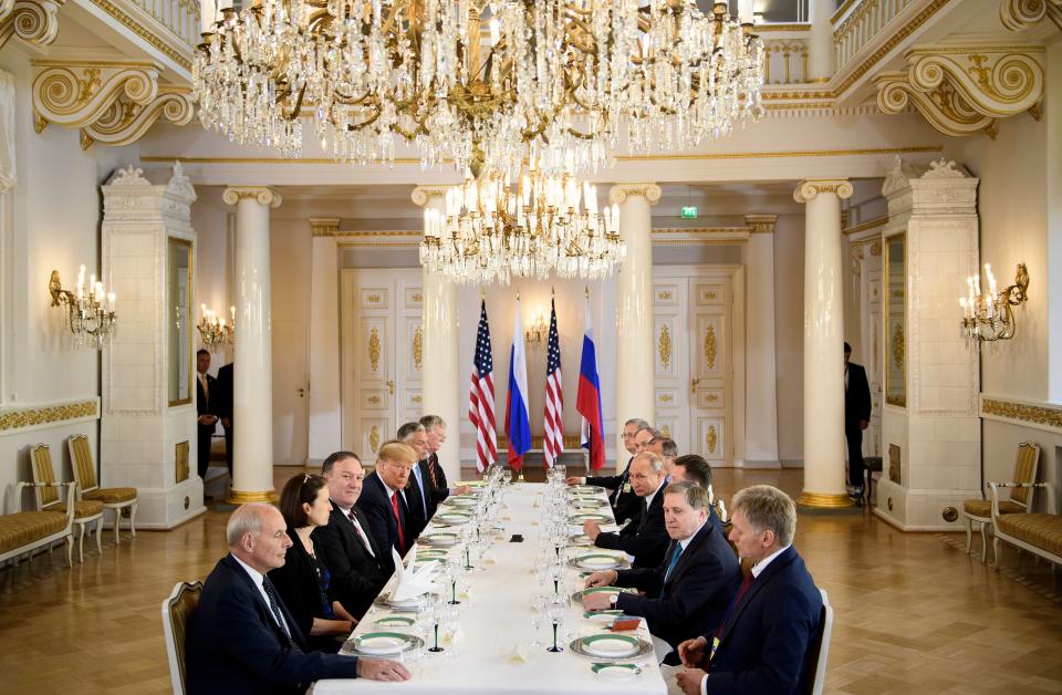 <p>U.S. President Donald Trump, Russia’s President Vladimir Putin and others wait for a working lunch meeting at Finland’s Presidential Palace on July 16, 2018 in Helsinki, Finland. (Photo: Brendan Smialowski / AFP) </p>