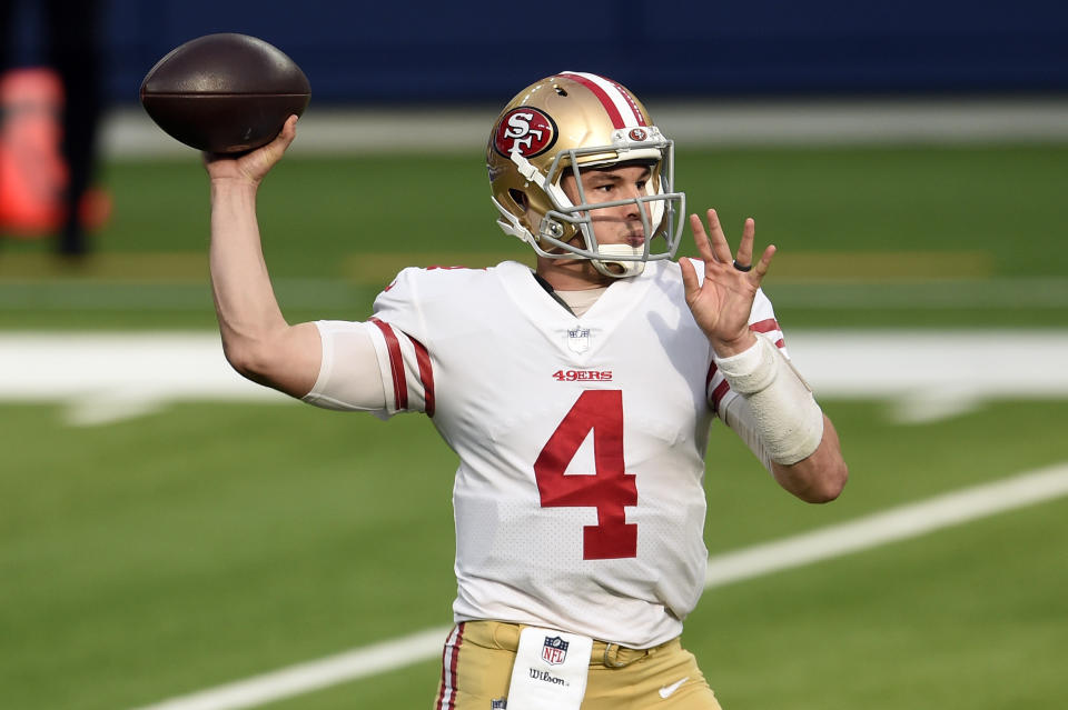 San Francisco 49ers quarterback Nick Mullens throws against the Los Angeles Rams during the first half of an NFL football game Sunday, Nov. 29, 2020, in Inglewood, Calif. (AP Photo/Kelvin Kuo)