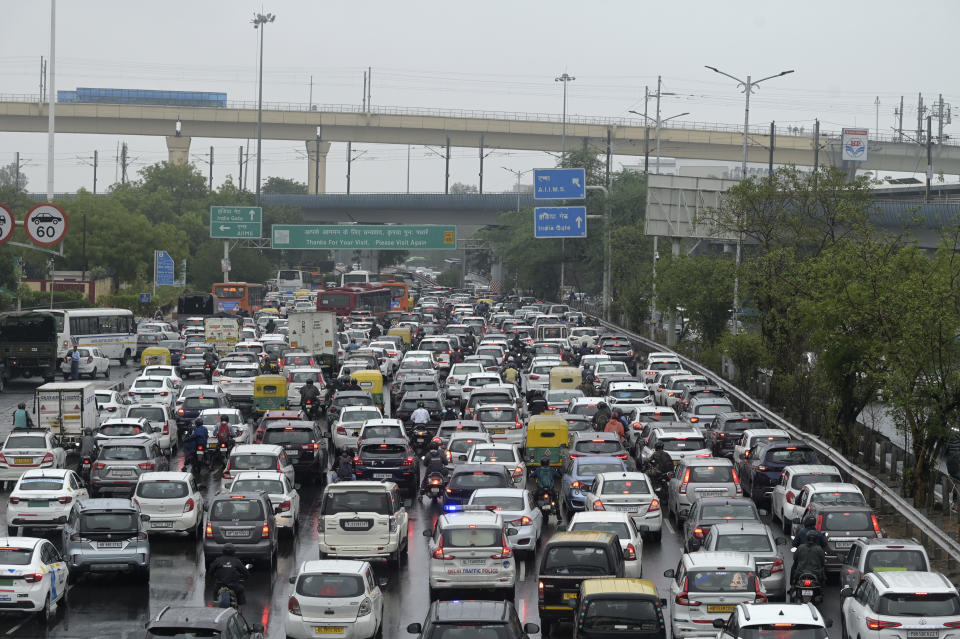 Vehicles are stuck in traffic on a highway near the Indira Gandhi International Airport after a heavy downpour disrupted vehicular movement in New Delhi, India, Friday, June 28, 2024. (AP Photo)