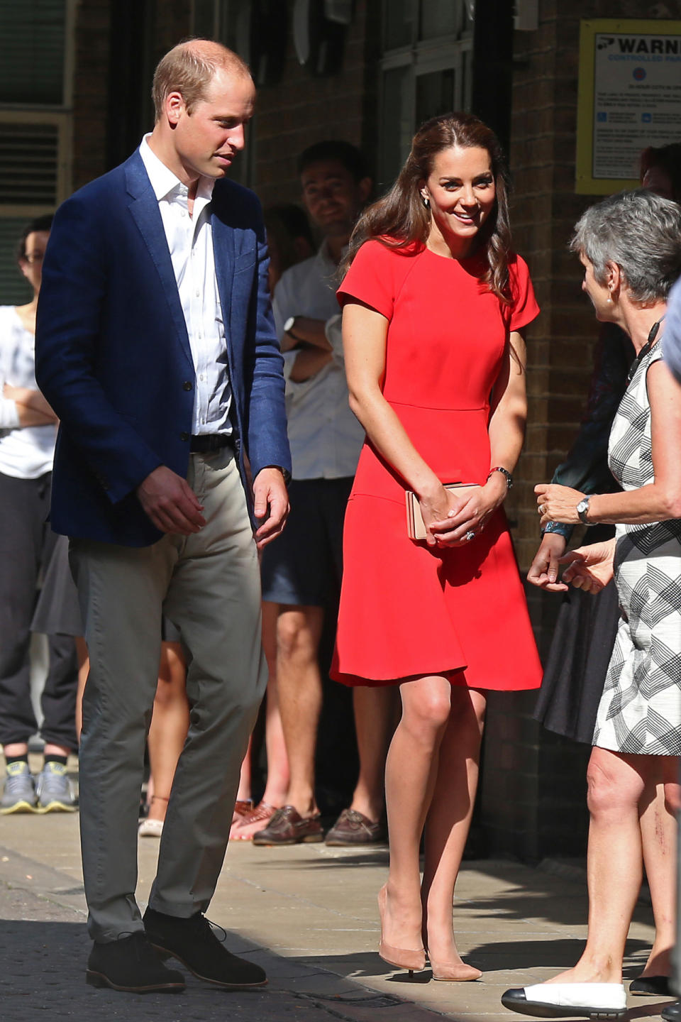 The Duchess of Cambridge in a red dress from LK Bennett at YoungMinds Mental Health Charity in London, England