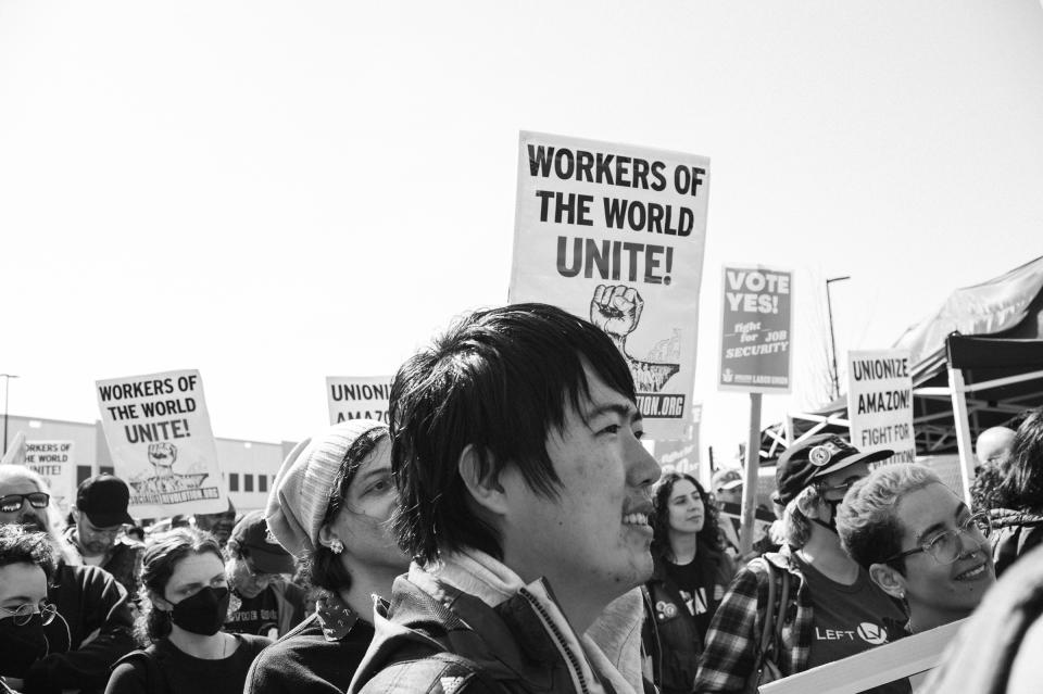 Demonstrators listen to speeches during an Amazon Labor Union (ALU) rally in Staten Island, New York on April 24, 2022.<span class="copyright">Stephen Obisanya for TIME</span>