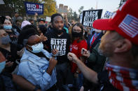 FILE - In this Oct. 7, 2020, file photo, supporters for former Vice President Joe Biden and Black Lives Matter, clash with President Donald Trump supporters prior to the vice presidential debate in Salt Lake City. Several years since its founding, BLM has evolved well beyond the initial aspirations of its early supporters. Now, its influence faces a test, as voters in the Tuesday, Nov. 3 general election choose or reject candidates who endorsed or denounced the BLM movement amid a national reckoning on race. (AP Photo/Jeff Swinger)