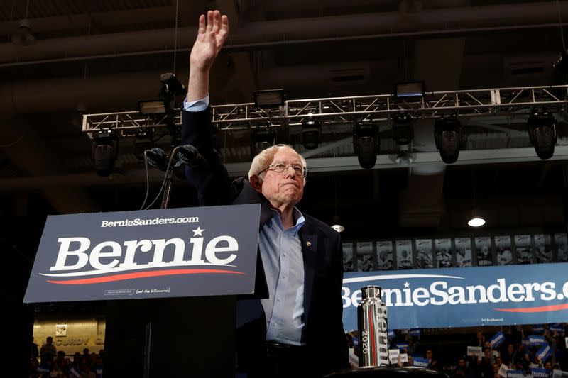 Democratic U.S. presidential candidate Senator Bernie Sanders reacsts to cheers at a campaign rally and concert at the University of New Hampshire in Durham