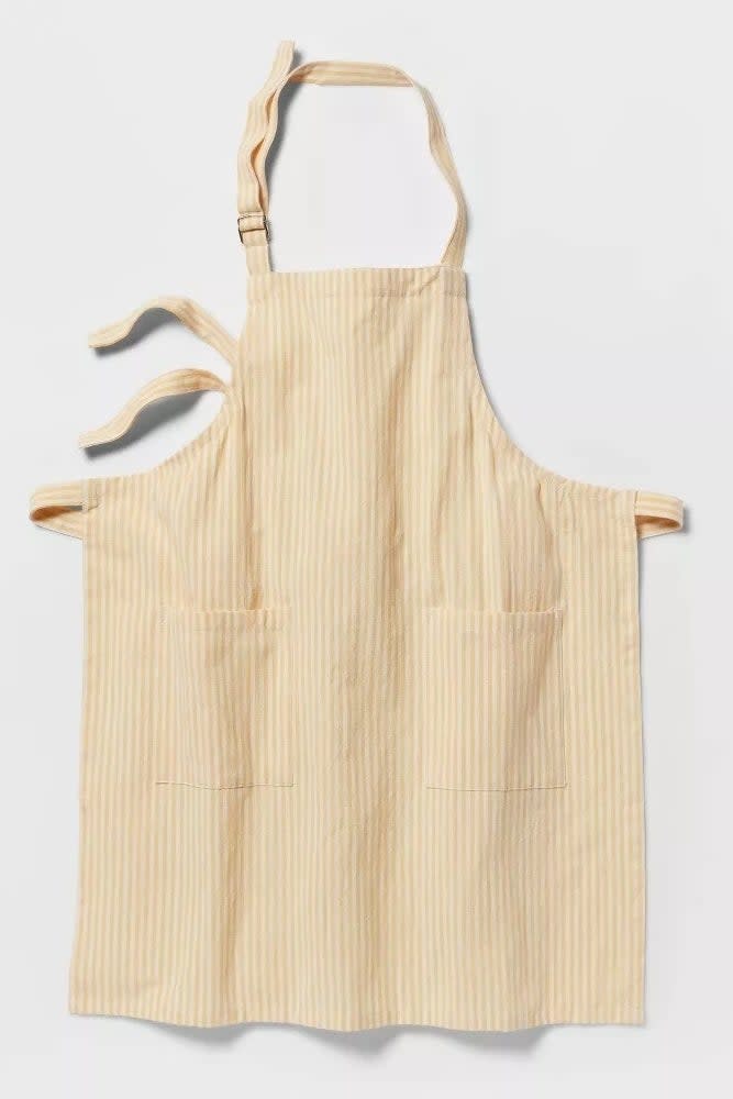 Striped apron with adjustable neck strap and two front pockets