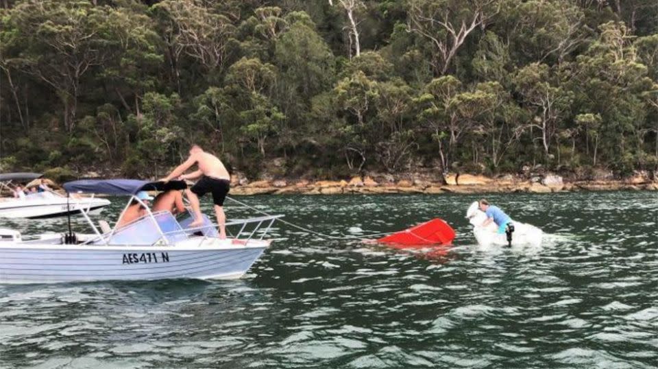 The group rushed to help after seeing the plane plunge into the river. Source: Supplied/Kurt Bratby.