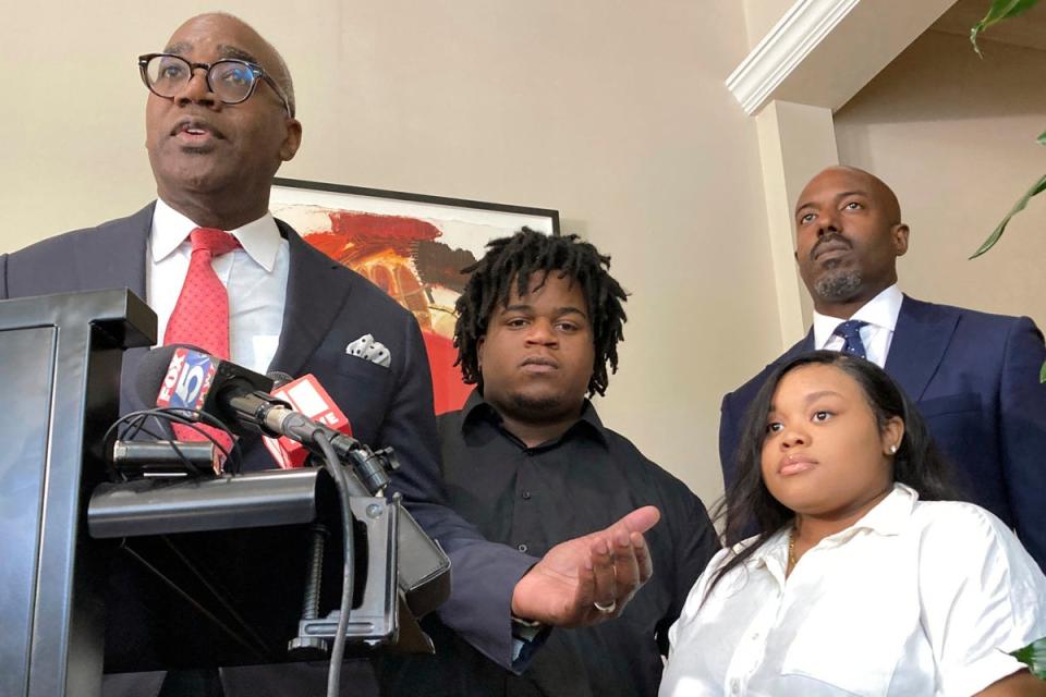 The baby’s mother and father Jessica Ross and Treveon Isaiah Taylor Sr (centre), with attorneys Roderick Edmond (left) and  Cory Lynch (right) (AP)