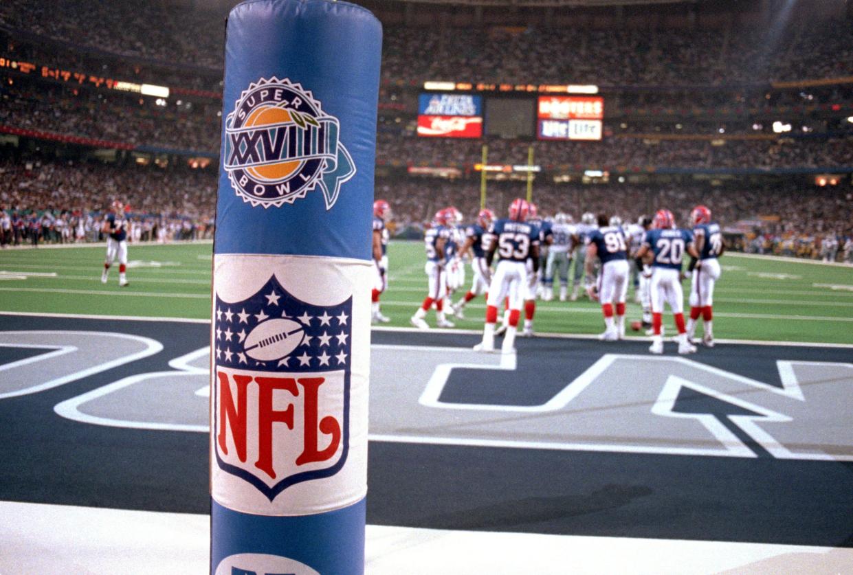 ATLANTA - JANUARY 30: Detail view of the NFL and Super Bowl XXVIII logo placed on the goal post during the championship game between the Dallas Cowboys and the Buffalo Bills at the Georgia Dome on January 30, 1994 in Atlanta, Georgia. The Cowboys won 30-13. (Photo by George Rose/Getty Images)