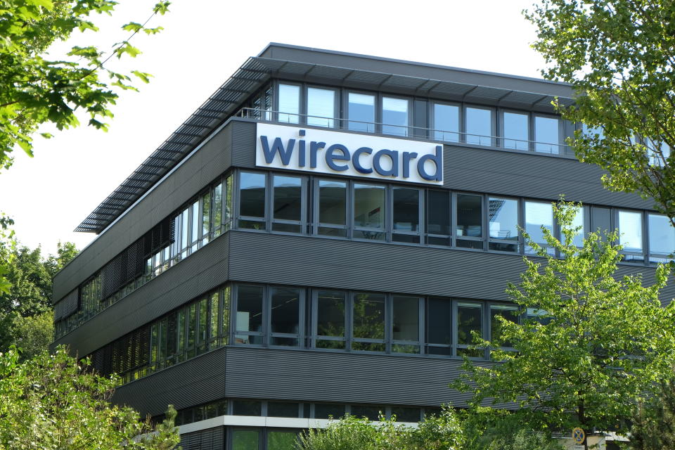 Aschheim, Germany / Bavaria - August 8, 2020: Wirecard bankrupt fintech corporation fortune 500 high-tech German electronic online payment company with logo near Munich Germany.