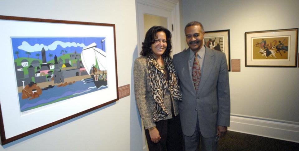 Dr. Walter O. Evans stands with his wife Linda among some of the Romare Bearden and Jacob Lawrence prints from his collection on display at the Savannah College of Art and Design Museum of Art on Martin Luther King Jr. blvd. Richard Burkhart/Savannah Morning News