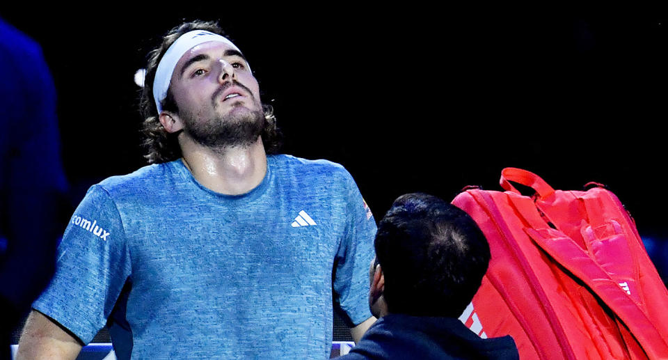 Seen here, Stefanos Tsitsipas receives treatment at the ATP Finals.