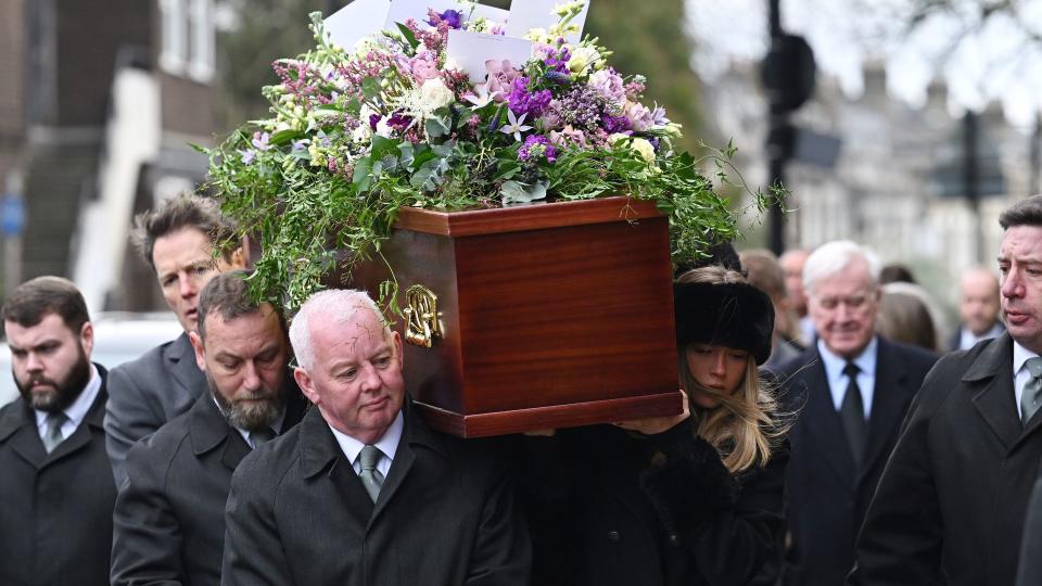 Darcey Draper carried her father's coffin into the church