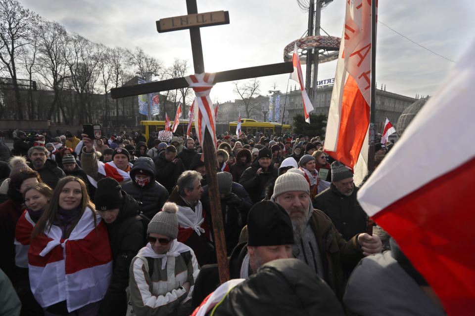 Protesters attend a rally in downtown Minsk, Belarus, Saturday, Dec. 7, 2019. More than 1,000 opposition demonstrators are rallying in Belarus to protest closer integration with Russia. Saturday's protest in the Belarusian capital comes as Belarusian President Alexander Lukashenko is holding talks with Russian President Vladimir Putin in Sochi on Russia's Black Sea coast. (AP Photo/Sergei Grits)