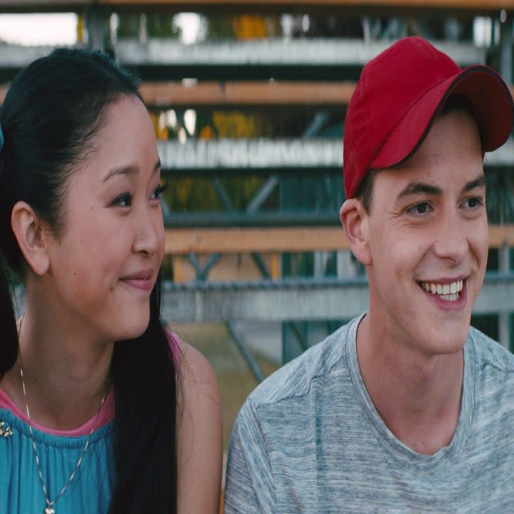 Lana Condor and Israel Broussard seated side by side