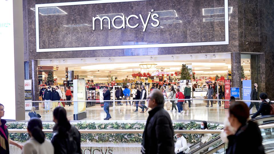 Shoppers pass a Macy's department store at the Westfield Garden State Plaza mall on Black Friday in Paramus, New Jersey, U.S., on Friday, Nov. 26, 2021. - Gabby Jones/Bloomberg/Getty Images