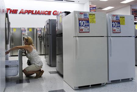 A woman shops for refrigerators at a store in New York in this file photo taken July 28, 2010. REUTERS/Shannon Stapleton/Files