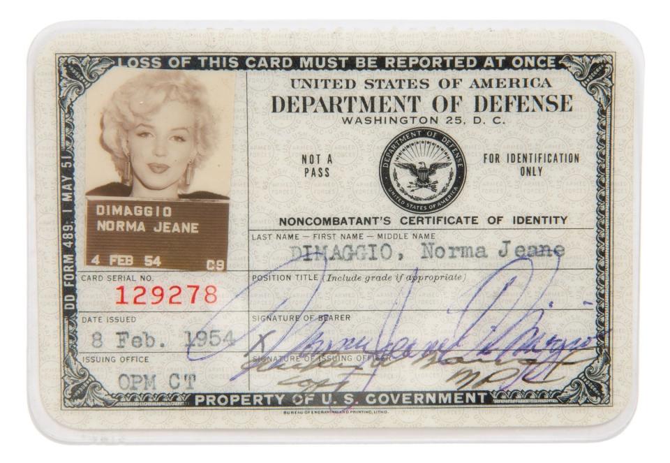Mandatory Credit: Photo by JuliensAuctions/Bournemouth News/Shutterstock (10479530c)Marilyn Monroe's 'Non Combatant's Certificate of Identity' card lists by her real name 'Norma Jeane DiMaggio'Marilyn Monroe memorabilia auction, Los Angeles, USA - Nov 2019*Full story: https://www.rexfeatures.com/nanolink/uu1sMarilyn Monroe's personalised army jacket and ID card have emerged for sale for £80,000. ($100,000). The starlet wore the green woollen jacket which is covered in army patches during her famous visit to entertain US troops in Korea in February 1954. The name 'Monroe' is in white stitching above the left pocket, and there are black and white photos of her posing in the long sleeved 'medium' sized jacket. Her 'Non Combatant's Certificate of Identity' card lists by her real name 'Norma Jeane DiMaggio' and there is a small photo of her in the top right hand corner of the laminated card, as well as her finger print. Also for sale is Monroe's address book which reveals who she was close to at the height of her career has emerged for sale for £23,000. ($30,000). The navy blue leather book contains a host of famous names including crooner Frank Sinatra and the 'Of Mice And Men' author John Steinbeck.