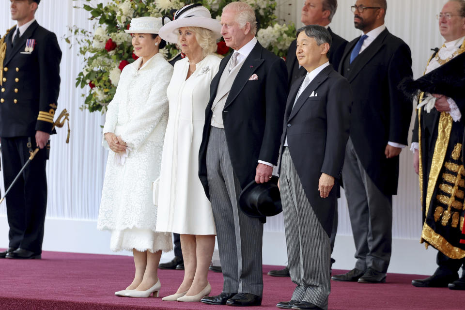 From left, Japan's Empress Masako, Britain's Queen Camilla, Britain's King Charles III and Japan's Emperor Naruhito pose for a family photo at the ceremonial welcome for their state visit to Britain, at Horse Guards Parade, London, Tuesday, June 25, 2024.(Chris Jackson/Pool Photo via AP)