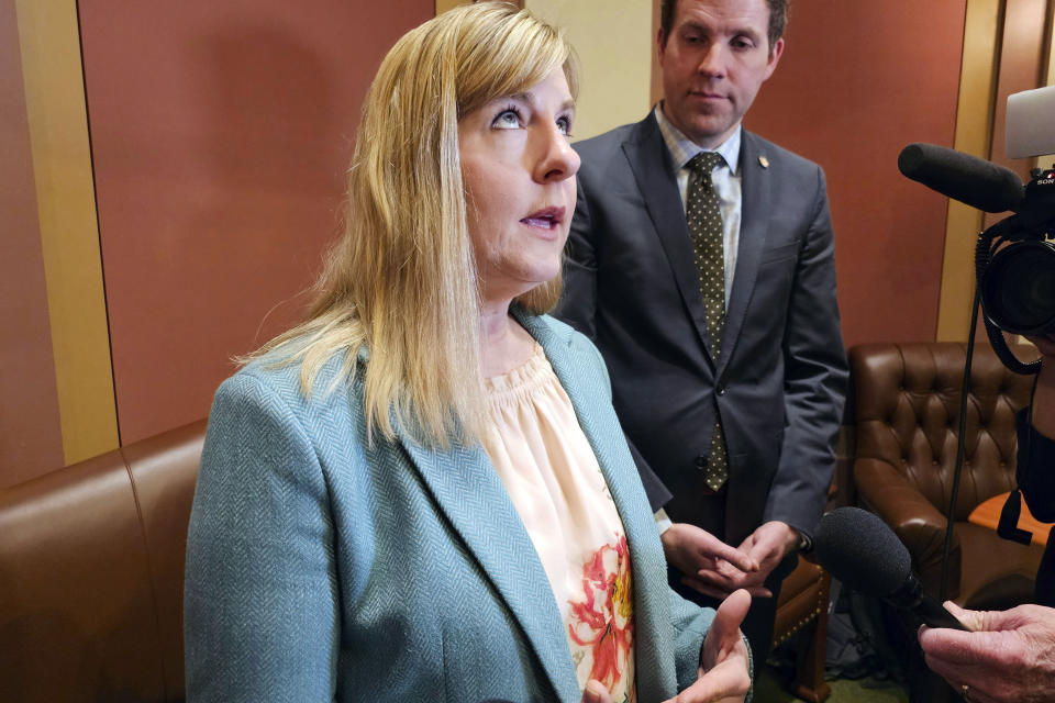 Democratic Minnesota House Speaker Melissa Hortman, of Brooklyn Park, and Democratic House Majority Leader Jamie Long, of Minneapolis, speak with reporters about sports betting and other legislation in the House chamber of the State Capitol, Thursday, May 2, 2024, in St. Paul, Minn. (AP Photo/Steve Karnowski)