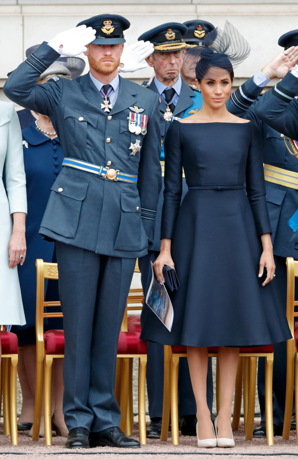 Prince Harry, Duke of Sussex and Meghan, Duchess of Sussex attend a ceremony to mark the centenary of the Royal Air Force on the forecourt of Buckingham Palace on July 10, 2018 in London, England