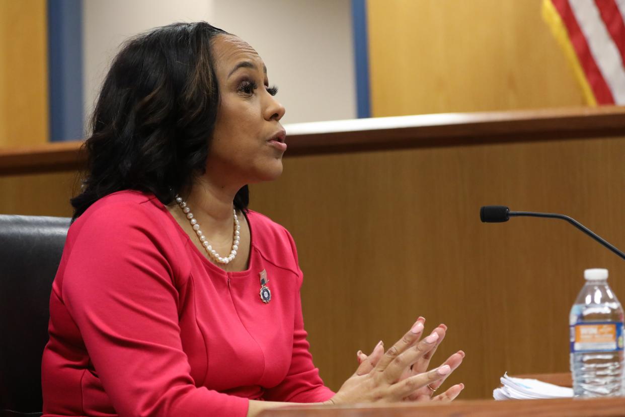 ATLANTA, GA - FEBRUARY 15: Fulton County District Attorney Fani Willis testifies during a hearing in the case of the State of Georgia v. Donald John Trump at the Fulton County Courthouse on February 15, 2024 in Atlanta, Georgia. Judge Scott McAfee is hearing testimony as to whether Willis and Special Prosecutor Nathan Wade should be disqualified from the case for allegedly lying about a personal relationship. (Photo by Alyssa Pointer-Pool/Getty Images)