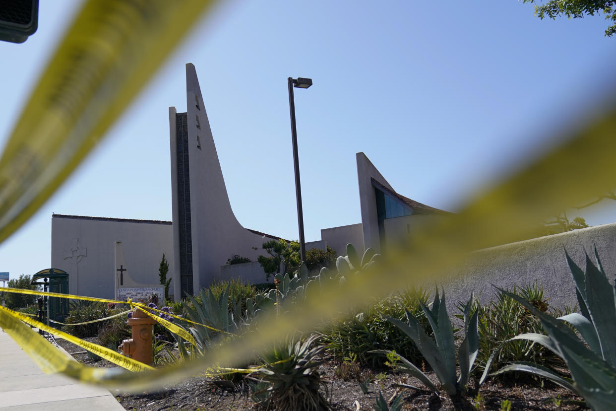 FILE - Crime scene tape surrounds Geneva Presbyterian Church on Tuesday, May 17, 2022, in Laguna Woods, Calif. A gunman opened fire on May 15 during a luncheon at the church, killing one and injuring five other members of a Taiwanese congregation that met there. (AP Photo/Ashley Landis, File)