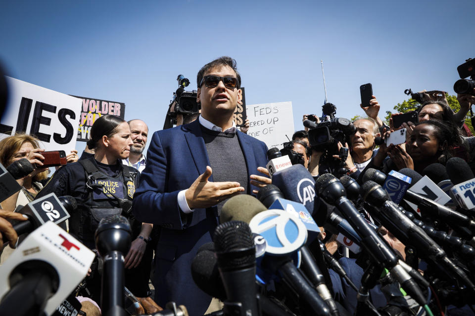 Image: Rep. George Santos, R-N.Y., speaks to the media outside the federal courthouse in Central Islip, N.Y., on May 10, 2023. (Stefan Jeremiah / AP)