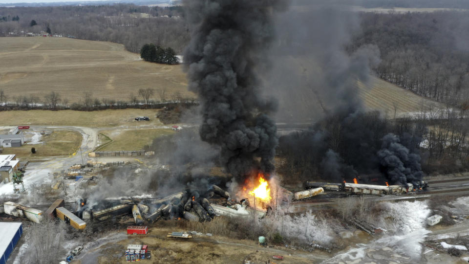 Portions of a Norfolk Southern freight train burns after a derailment in East Palestine, Ohio (Gene J. Puskar / AP file)