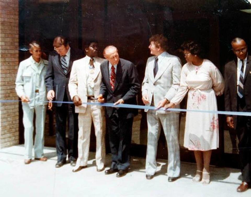 Photos from a collection by Atlantic Beach resident Alice Graham. From the ribbon ceremony of the Atlantic Beach Community Center. Names listed from right to left. M.M. Rucker, Earlene Woods, John Jenrette, Strom Thurmond and Joe Montgomery. The two people to the left were not identified.