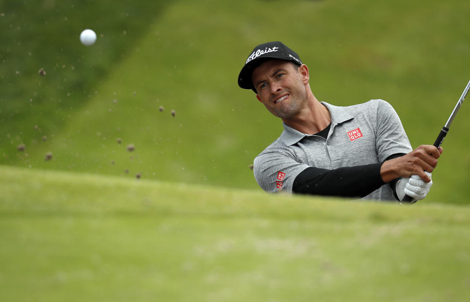 Adam Scott, of Australia, hits out of the bunker on the 17th hole during the second round of the Genesis Open golf tournament at Riviera Country Club Saturday, Feb. 18, 2017, in the Pacific Palisades area of Los Angeles. (AP Photo/Ryan Kang)