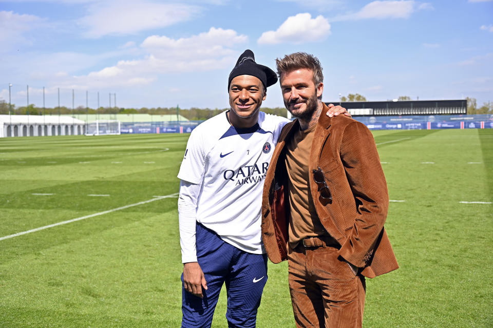 PARIS, FRANCE - APRIL 27: Kylian Mbappe and David Beckham pose after a Paris Saint-Germain training session on April 27, 2023 in Paris, France. (Photo by Aurelien Meunier - PSG/PSG via Getty Images)