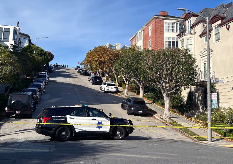 SAN FRANCISCO CA OCTOBER 28, 2022 - Police officers blocked the street outside the San Francisco home of U.S. House Speaker Nancy Pelosi and her husband Paul Pelosi on Friday, October 28, 2022. (Hannah Wiley / Los Angeles Times)