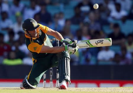 South Africa's AB de Villiers hits a six during the Cricket World Cup match against the West Indies at the Sydney Cricket Ground (SCG) February 27, 2015. REUTERS/Jason Reed