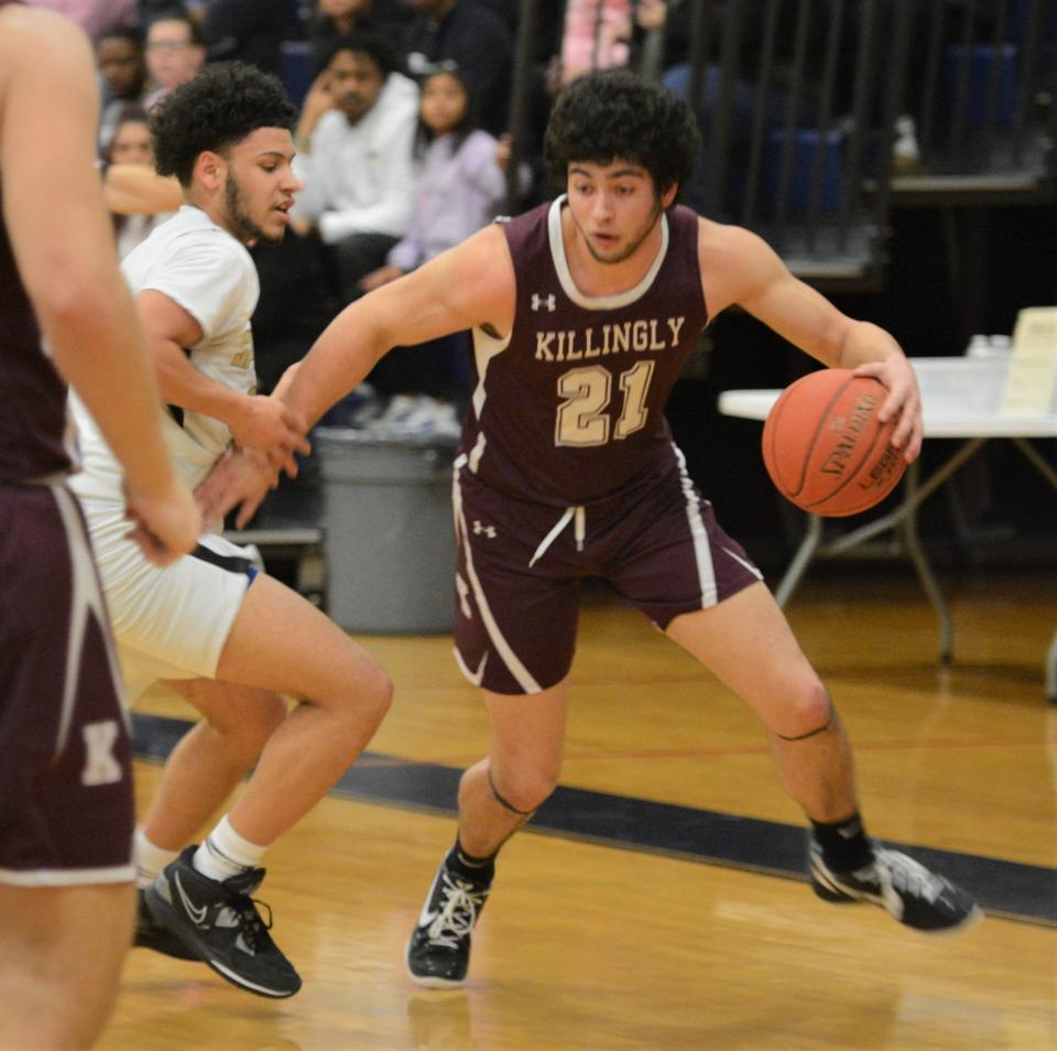 Killingly senior Yianni Baribeau makes a move against WCA on Friday night at Kennedy High School in Waterbury.