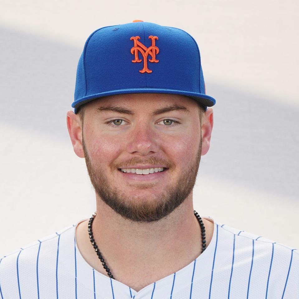 New York Mets pitcher Christian Scott (96) poses for a photo during media day on Feb. 22, 2024.
